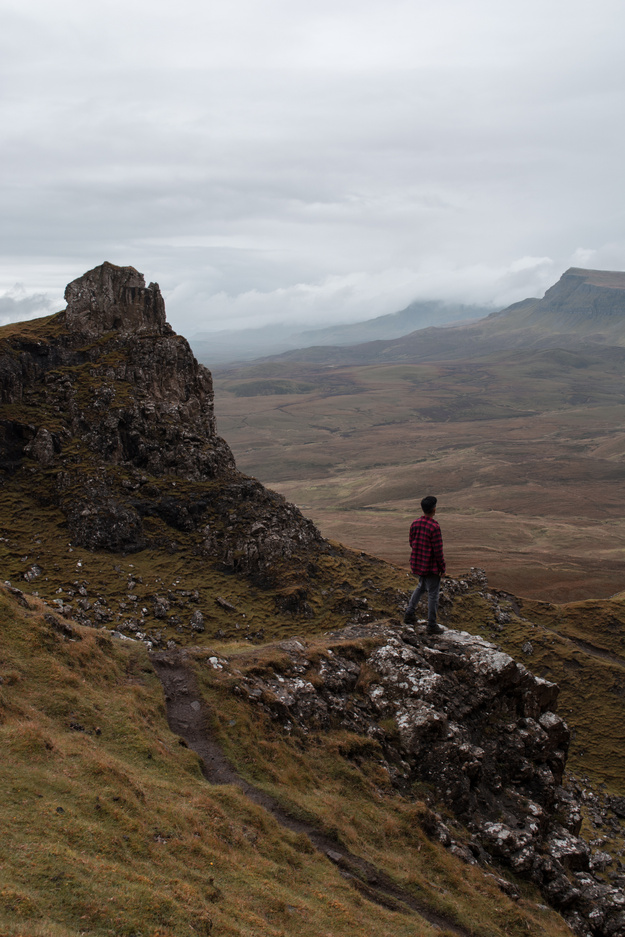 Man  Standing on Rock Mountain